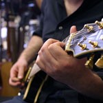 Elements on Learning and Mastering a Guitar