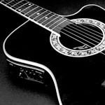 Taking Easy Lessons with an Acoustic Guitar