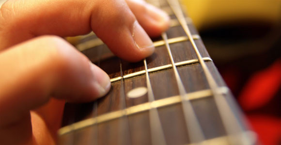 Learn To Play Guitar In No Time!